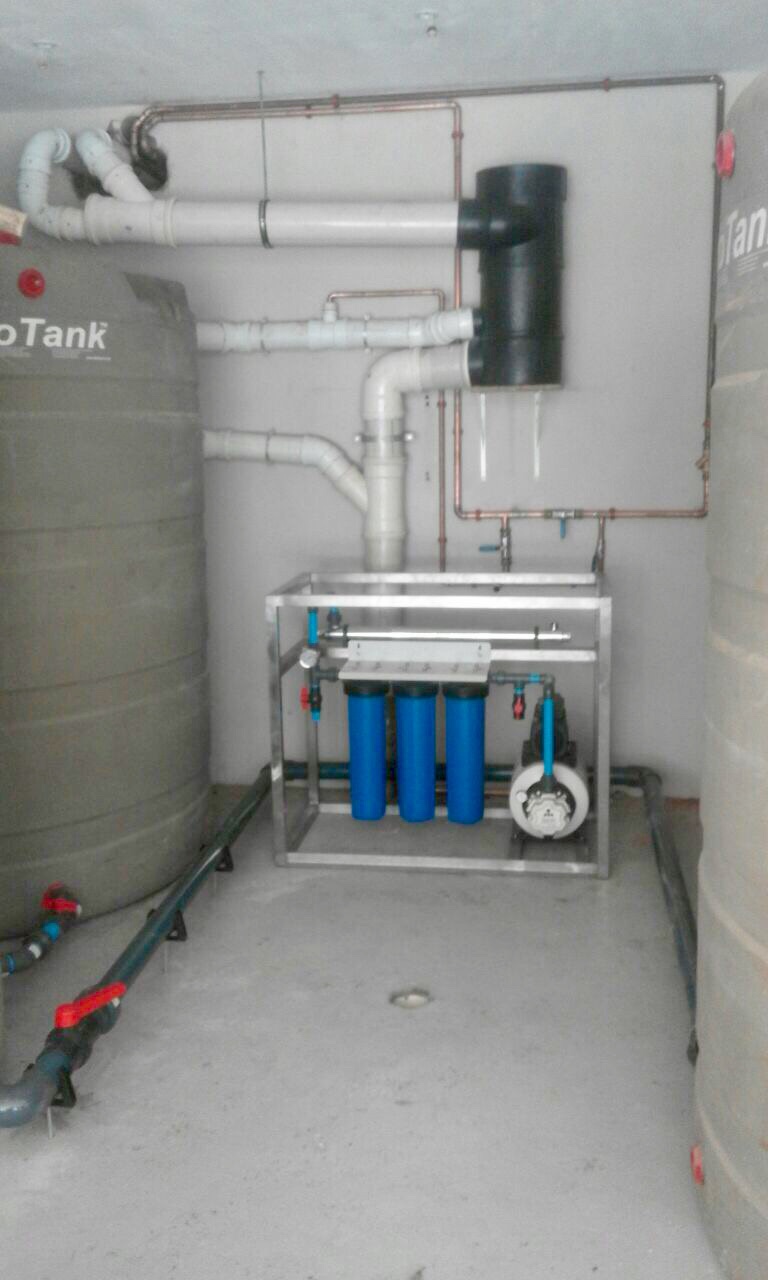 Integrated potable rainwater harvesting treatment system 